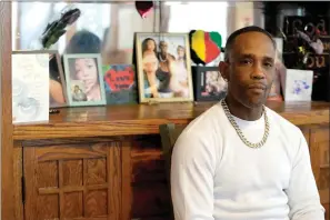  ?? (AP Photo/Abbie Parr) ?? Damone Presley sits next to a memorial area in his house for his daughter, Nitosha, Thursday, May 4, 2023, in St. Paul, Minn. Nitosha and her three friends were found shot to death inside an SUV in the middle of a Wisconsin cornfield, though they were killed in St. Paul, Minnesota.