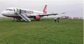  ?? FOTO: ELIAS/FW WESTERLAND/DPA ?? Das Flugzeug stoppte 50 Meter hinter der Landebahn, Passagiere und Besatzung blieben unverletzt.