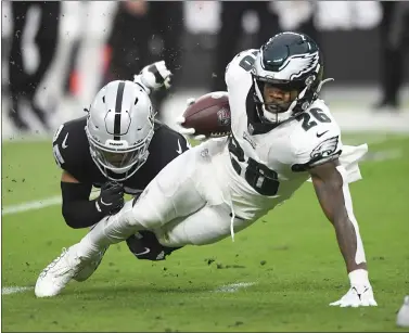  ?? DENIS POROY - THE ASSOCIATED PRESS ?? Running back Miles Sanders, seen in a game against the Raiders earlier this season, is returning Sunday from an injury absence as the Eagles host the Saints.