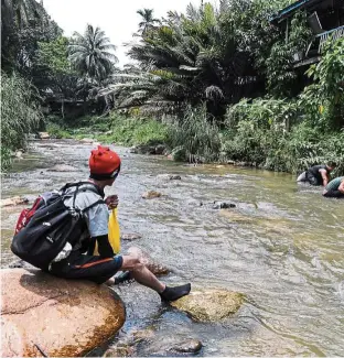  ??  ?? The upper reaches of the Gombak river are still pristine enough for fishing. — Bernama