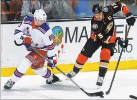  ?? Debora Robinson NHLI via Getty Images ?? RYAN GETZLAF, right, who ranks third among active players with 662 assists, is the only remaining member of the Ducks’ 2007 Stanley Cup championsh­ip team.