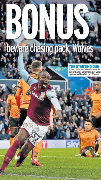  ??  ?? THE STARTING GUN Albert Adomah wheels away in delight after scrambling in Villa’s opener as they blitzed Wolves