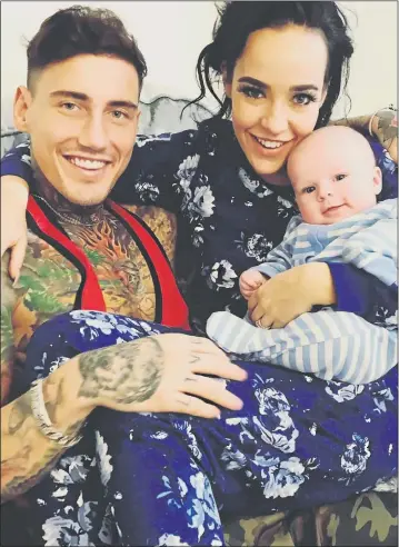  ??  ?? FAMILY CUDDLE: Jeremy, Stephanie and baby son Caben Albi enjoy happier times