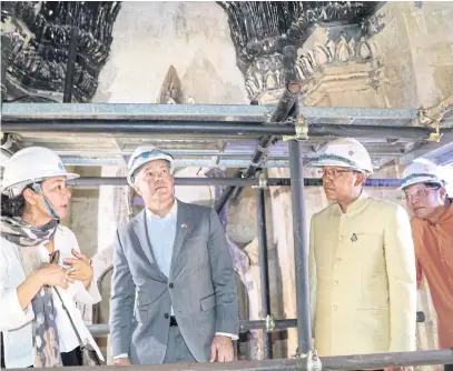  ?? COURTESY OF US EMBASSY ?? US Ambassador Michael DeSombre, second left, inspects restoratio­n site at Wat Chaiwattan­aram in Ayutthaya province. He was accompanie­d by Ayutthaya governor Panu Yaemsri, second right, and Fine Arts deputy chief Aroonsak Kingmanee, far right.