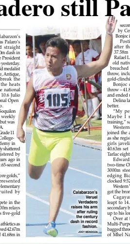  ?? JOEY MENDOZA ?? Calabarzon’s Veruel Verdadero raises his arm after ruling the century dash in record fashion.