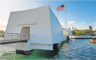  ?? [COURTESY OF THE NATIONAL WWII MUSEUM] ?? The Pearl Harbor National Memorial reflects how many — but not all — in the U.S. remember and honor WWII today.