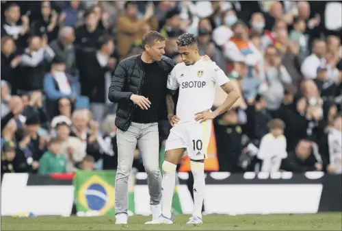  ?? PICTURE: LEWIS STOREY/GETTY IMAGES ?? WINGING IT: Leeds United boss Jesse Marsch getting his message across to winger Raphinha, who has scored just once under his new coach.