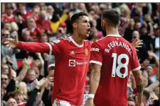  ?? (AP/Rui Vierira) ?? Cristiano Ronaldo scored two goals in his return to Manchester United and the English Premier League during Saturday’s 4-1 victory over Newcastle United.