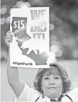  ?? DAVID MCNEW, GETTY IMAGES ?? A minimum wage rally in Los Angeles on Monday.