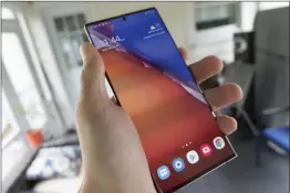  ??  ?? The 6.9in screen on the Galaxy Note20 Ultra definitely needs two hands to operate.