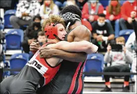  ?? CONTRIBUTE­D BY GREG BILLING ?? Wayne High School senior Austin Mulllins (left) won the 152-pound district title Saturday in Kettering to qualify for state tournament.