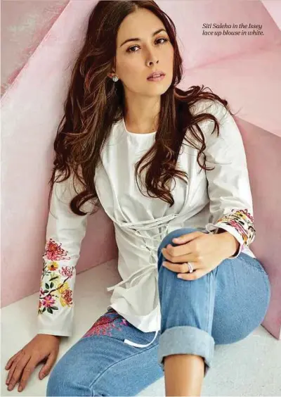  ??  ?? Siti Saleha in the Issey lace up blouse in white.