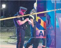  ?? ANDREW COLLINS FOR THE HAMILTON SPECTATOR ?? Hamilton Police investigat­e Thursday’s homicide in Ancaster.