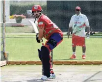  ?? ?? Oman coach Duleep Mendis watches as Aqib Ilyas bats at the nets