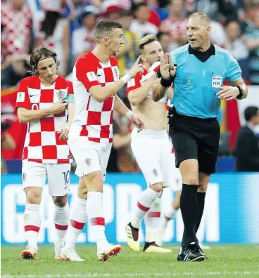  ?? PETR DAVID JOSEK / THE ASSOCIATED PRESS ?? Croatia’s Ivan Perisic argues with referee Nestor Pitana during Sunday’s World Cup final against France in Moscow. Pitana’s officiatin­g drew the ire of the Croatian team, and its fans, during France’s 4-2 victory.