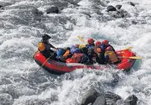  ?? PHOTO: LOIS MCARTNEY ?? Lean in and hold on . . . Rafting the Waiau River in North Canterbury with the Gabites clan on the last day of 2020.