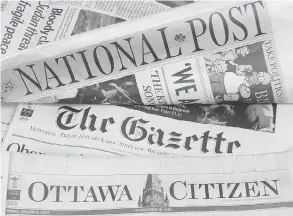  ?? ADRIAN WYLD / THE CANADIAN PRESS ?? Some of Postmedia’s newspapers are displayed in Ottawa on January 8, 2010. Quebecor