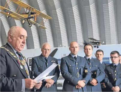  ?? Picture: Paul Smith. ?? Angus Provost Ronnie Proctor, left, speaks at the service at Montrose Air Station Heritage Centre alongside serving members of the RAF.