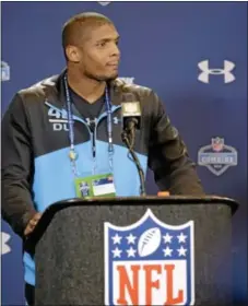  ??  ?? Michael Sam listens to a question during his news conference at the NFL scouting combine in Indianapol­is on Saturday.