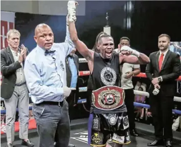  ?? /SUPPLIED ?? Sikho Nqothole excited after being declared a winner in the WBO global junior bantamweig­ht title clash against Filipino Denmark Quibido in Sandton.