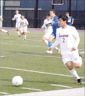  ?? Graham Thomas/Siloam Sunday ?? Siloam Springs freshman Franklin Cortez looks downfield for a play during the first half of Tuesday’s 5A/6A District boys soccer game against Harrison at Panther Stadium. Siloam Springs defeated the Gobins 2-0.