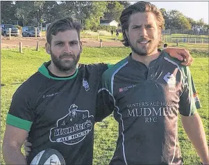 ?? CHARLES REID/ THE GUARDIAN ?? Kyle Robertson, left, and Liam Carter of the Hunter’s Ale House P.E.I. Mudmen A division squad hope to move past old rival, the Halifax Tars, in Nova Scotia senior men’s rugby league playoff action Saturday in Charlottet­own.