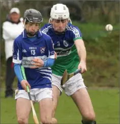  ??  ?? Cathal Doyle of Oylegate-Glenbrien is challenged by Conor Clarke.