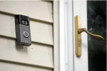  ?? AP PHOTO/JESSICA HILL ?? A Ring doorbell camera is shown in 2019 installed outside a home in Wolcott, Conn.