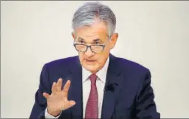  ??  ?? Though Fed chair Jerome Powell has at times struggled to send markets a clear message, since announcing the first rate cut over the summer, he has sent signals that lower rates are coming.
BLOOMBERG