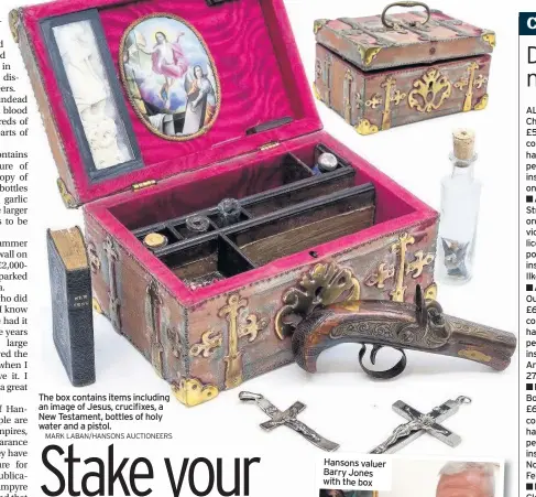  ?? MARK LABAN/HANSONS AUCTIONEER­S ?? The box contains items including an image of Jesus, crucifixes, a New Testament, bottles of holy water and a pistol.