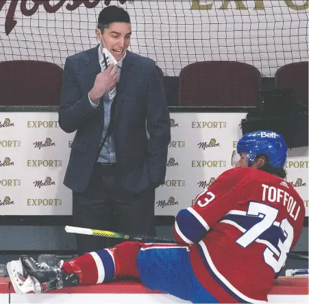  ?? ALLEN MCINNIS ?? Canadiens assistant coach Alex Burrows speaks with winger Tyler Toffoli during a pre-game skate against the Senators last week.