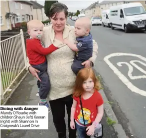  ??  ?? Dicing with danger Mandy O’Rourke with children Shaun (left) Keeran (right) with Shannon in Craigneuk’s Laurel Drive