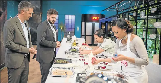  ?? Picture: SUPPLIED ?? CULINARY COUNTDOWN: ‘My Kitchen Rules’ judges David Higgs and J’Something oversee contestant­s Kerry Sonn and former East Londoner Charnell Young, right. Sonn and Young are finalists in the M-Net amateur foodie reality show and are one step away from a...