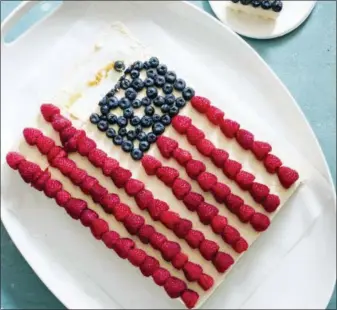  ?? CARL TREMBLAY/AMERICA’S TEST KITCHEN VIA ASSOCIATED PRESS ?? This undated photo provided by America’s Test Kitchen shows a U.S. flag cake in Brookline, Mass.