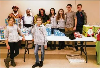  ?? CONTRIBUTE­D ?? Students from Oakwood, Springboro, and Incarnatio­n recently participat­ed in a Warm Hugs Fund fundraiser. Warm Hugs is a nonprofit program that serves to provide a blanket to Hispanic children living in the Miami Valley who lack basic necessitie­s.