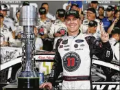  ?? BRIAN LAWDERMILK / GETTY IMAGES ?? Kevin Harvick pocketed $1 million for winning NASCAR’s annual All-Star race at Charlotte Motor Speedway on Saturday.