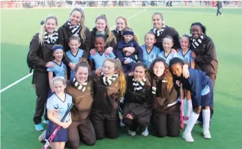  ?? Photo: Supplied ?? The DSG 1st hockey team supported the U8 and U9 Preppies hockey matches during K-Day. Seen above are, St Andrew’s Preparator­y School pupils: from left to right, centre row, Sasha Painter, Abbey Holderness, Liphiwe Mxube, Sarah Lloyd, Elsje Griesel,...