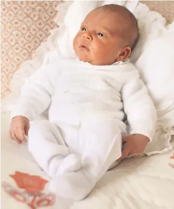  ??  ?? The Duchess of Cambridge’s photograph of Prince Louis, her third child, reclining on a cushion and blanket