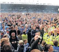  ??  ?? FRATT PACK JOY: Portsmouth fans enjoy the crowning glory