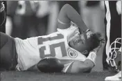  ?? ASSOCIATED PRESS ?? KANSAS CITY CHIEFS quarterbac­k Patrick Mahomes (15) lies on the field after being injured against the Denver Broncos during the first half of Thursday’s game in Denver.