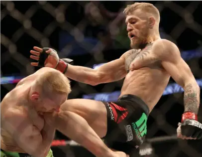  ?? FOTO: AP ?? Den irske MMA-stjerne møder Dennis Siver og vinder kampen i 2. omgang.