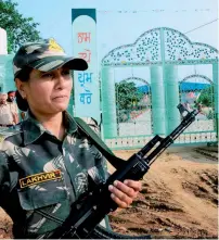  ?? PTI ?? A CRPF woman stand guard at the camp of Dera Sacha Sauda chief at Sangrur Highway in Patiala. —