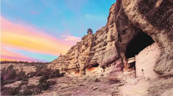  ?? COURTESY OF NATIONAL PARK FOUNDATION ?? The sunrise glow lights up the Gila Cliff Dwelling National Monument.