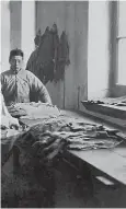  ?? ?? Paul Komor (front right) inspects leather samples at the tannery he managed before
WWI in Shanghai. —Courtesy of Valerie S, Komor, NY