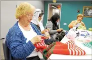  ?? MEDIANEWS GROUP FILE PHOTO ?? In 2013, Mary Luthy, left, was pictured as a member of the Yarn Crafters, working out of the Wissahicko­n Library Sept. 18, 2013. Photo by Gene Walsh / Times Herald Staff