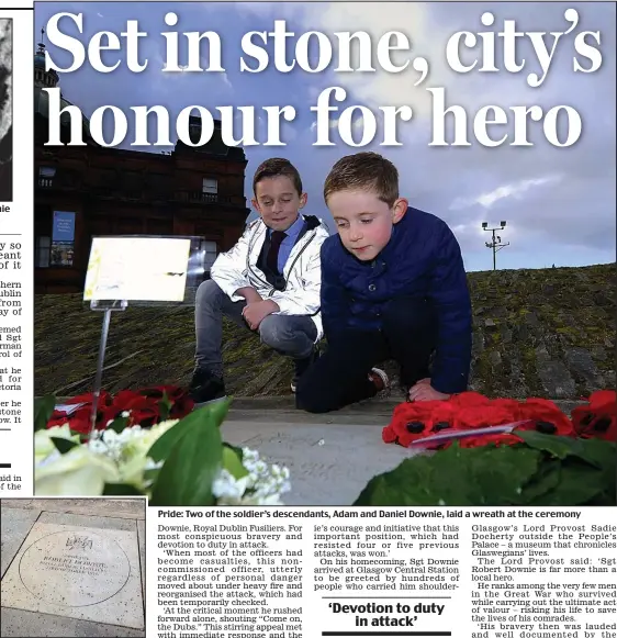  ??  ?? Honour: The memorial stone Pride: Two of the soldier’s descendant­s, Adam and Daniel Downie, laid a wreath at the ceremony
