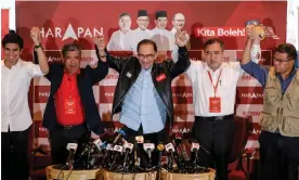  ?? Photograph: Fazry Ismail/EPA ?? Anwar Ibrahim’s (centre) coalition won most seats in the election, but not enough for a simple majority in parliament.