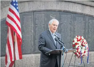  ??  ?? US Secretary of State Rex Tillerson speaks to survivors after laying a wreath during a ceremony at Memorial Park in honour of the victims of the deadly 1998 US Embassy bombing in Nairobi, Kenya on Sunday.