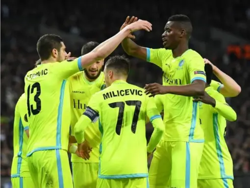  ??  ?? Gent players celebrate after Harry Kane's own goal leveled the score at 1-1 (Getty)