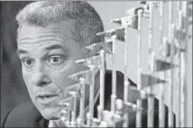  ?? Charlie Riedel Associated Press ?? DAYTON MOORE installed a process as the Kansas City Royals’ general manager to yield a big payoff down the line.